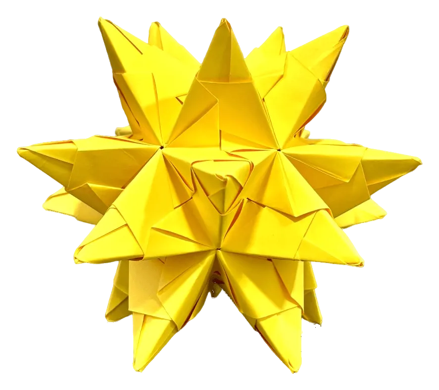 A yellow Bascetta Star, folded by hand from 30 modules